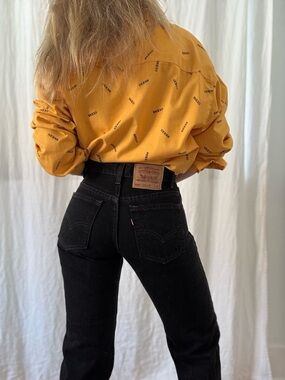 Vintage Levi’s 555 relaxed fit straight leg pristine dark black made in USA 90s